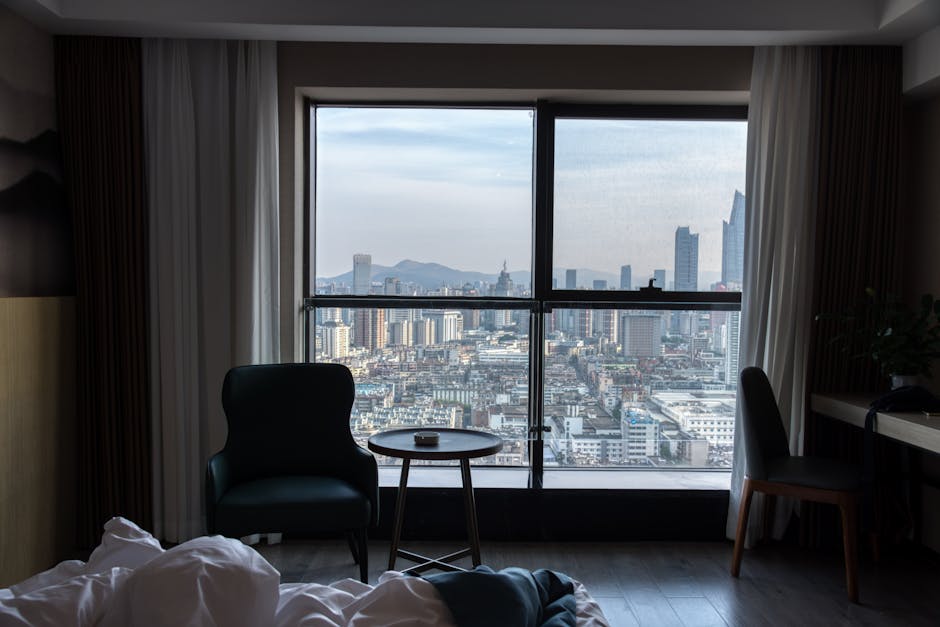Best hotels Adelaide CBD room with city skyline view from window