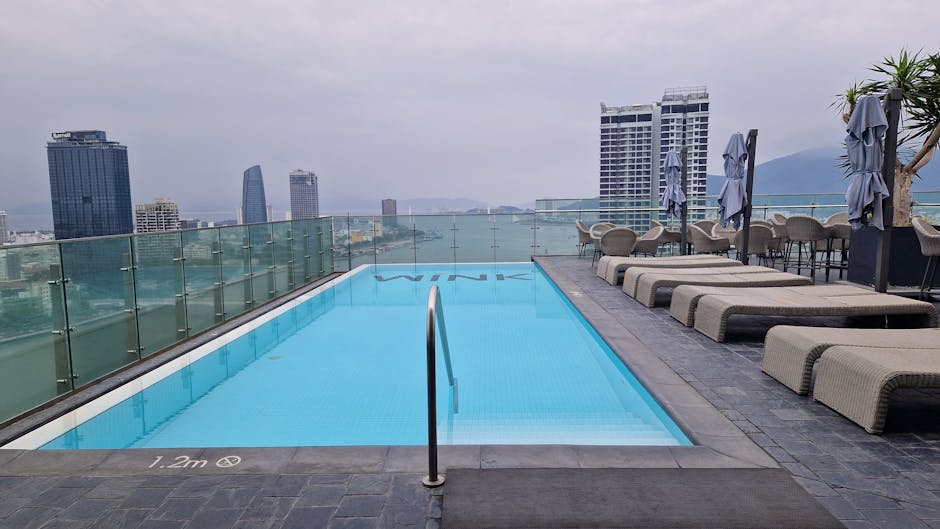 Best hotels Adelaide CBD rooftop pool with city skyline views