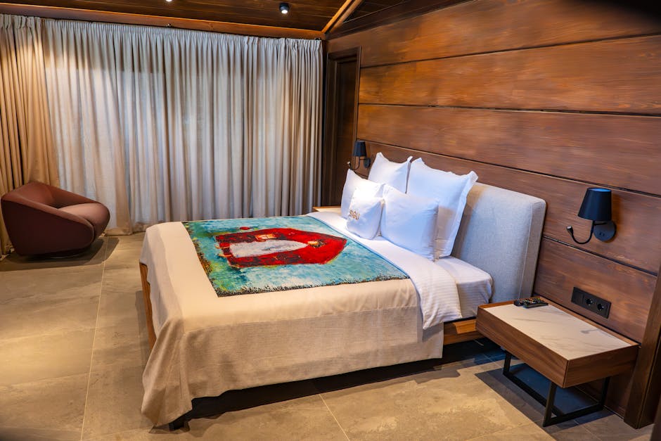 Best hotels Adelaide CBD boutique hotel bedroom with designer furnishings