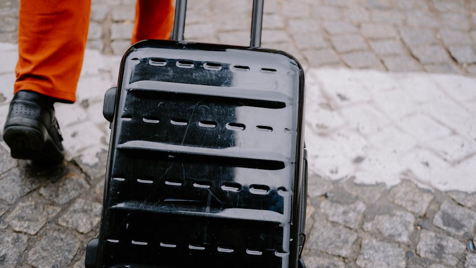 Adelaide airport to city traveler with suitcase walking in city street