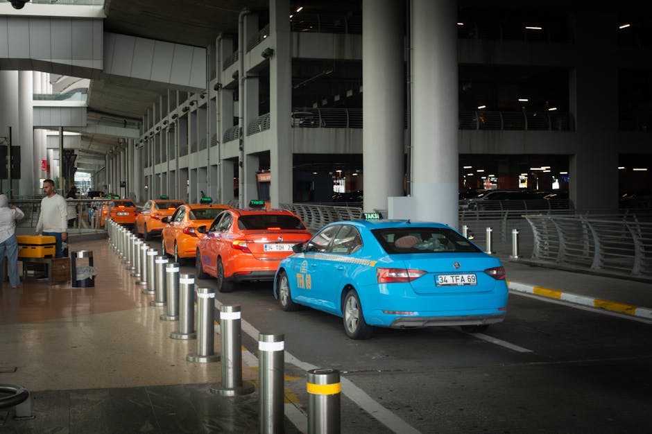 Taxi rank at Adelaide airport with passengers and luggage
