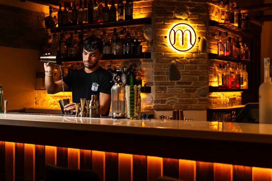 Cocktail bar in Adelaide with bartender crafting artisan drinks
