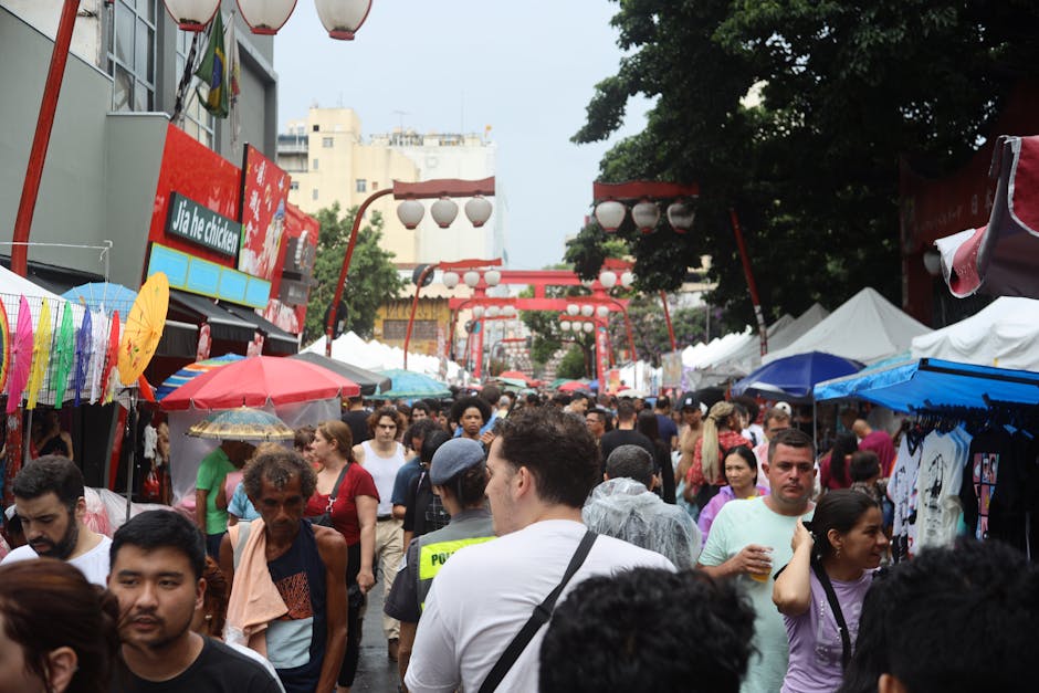 Arts festival market with crowds enjoying cultural performances