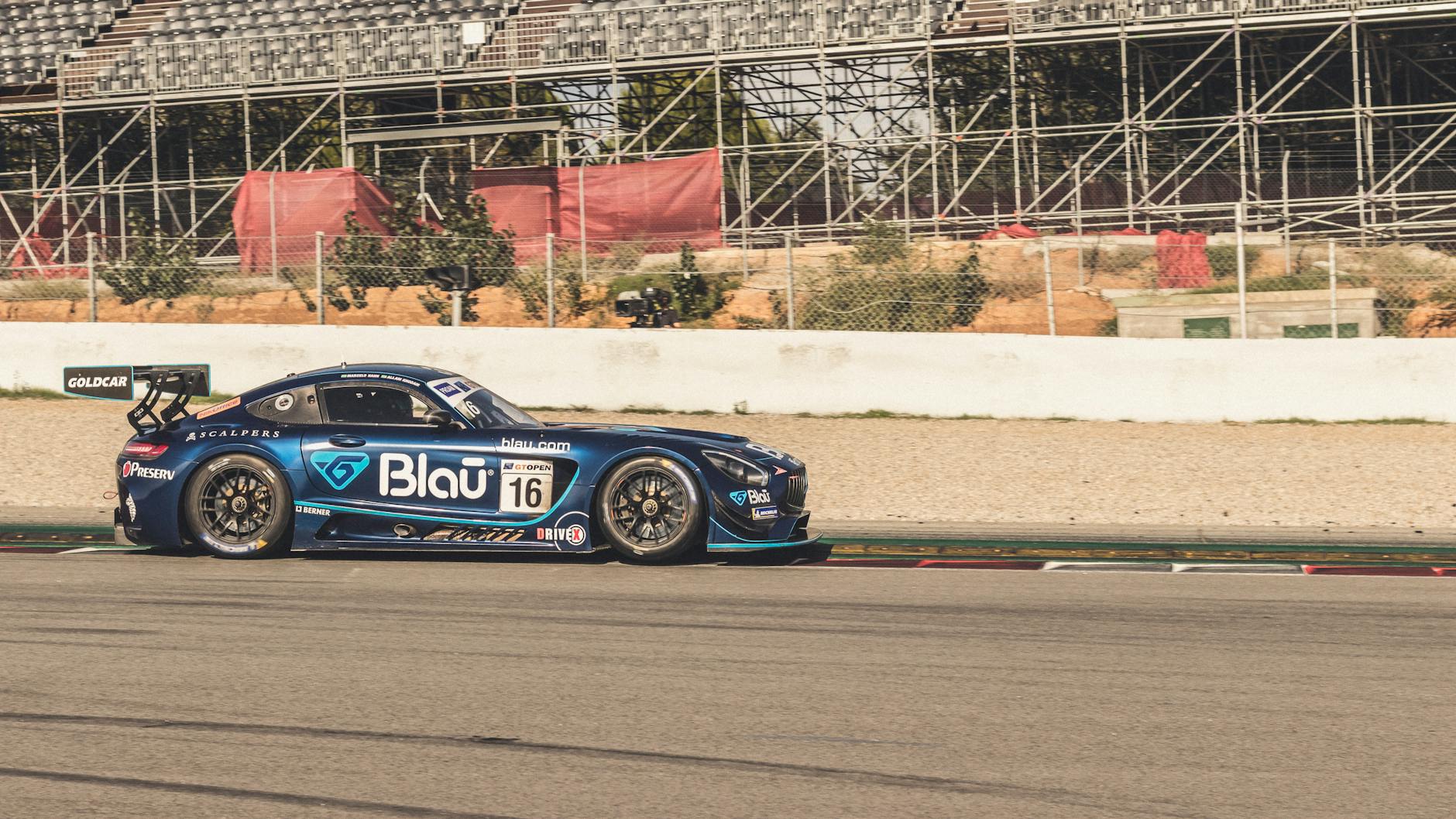 A Supercar at speed on the Adelaide 500 street circuit