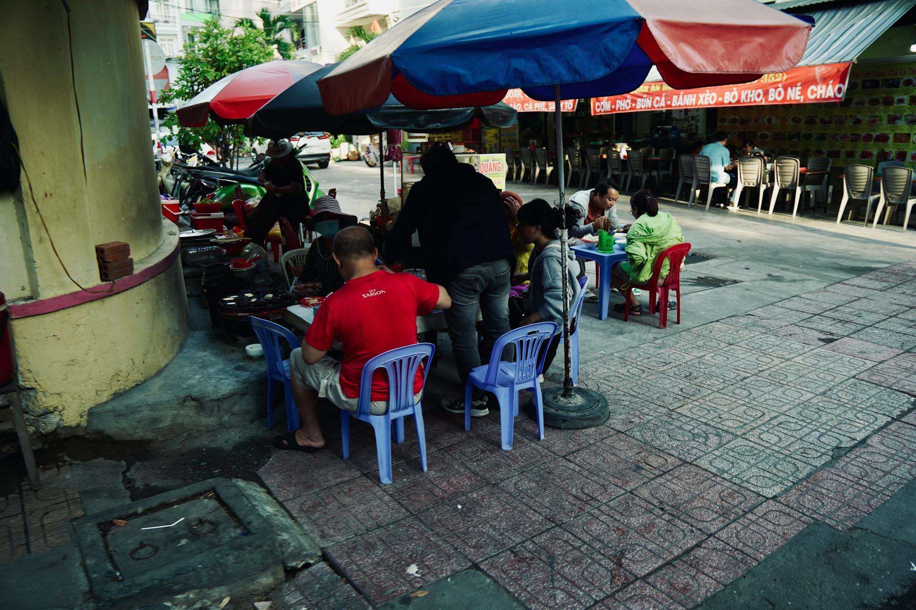 A family eating together at a market cafe in Adelaide