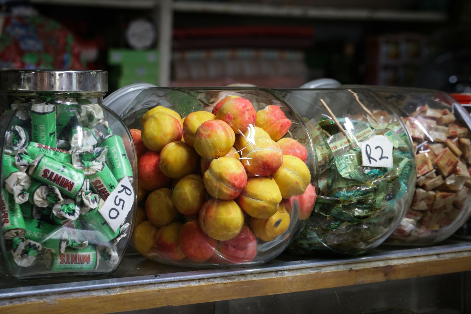 Jars of colourful lollies and sweets at an old-fashioned confectionery shop