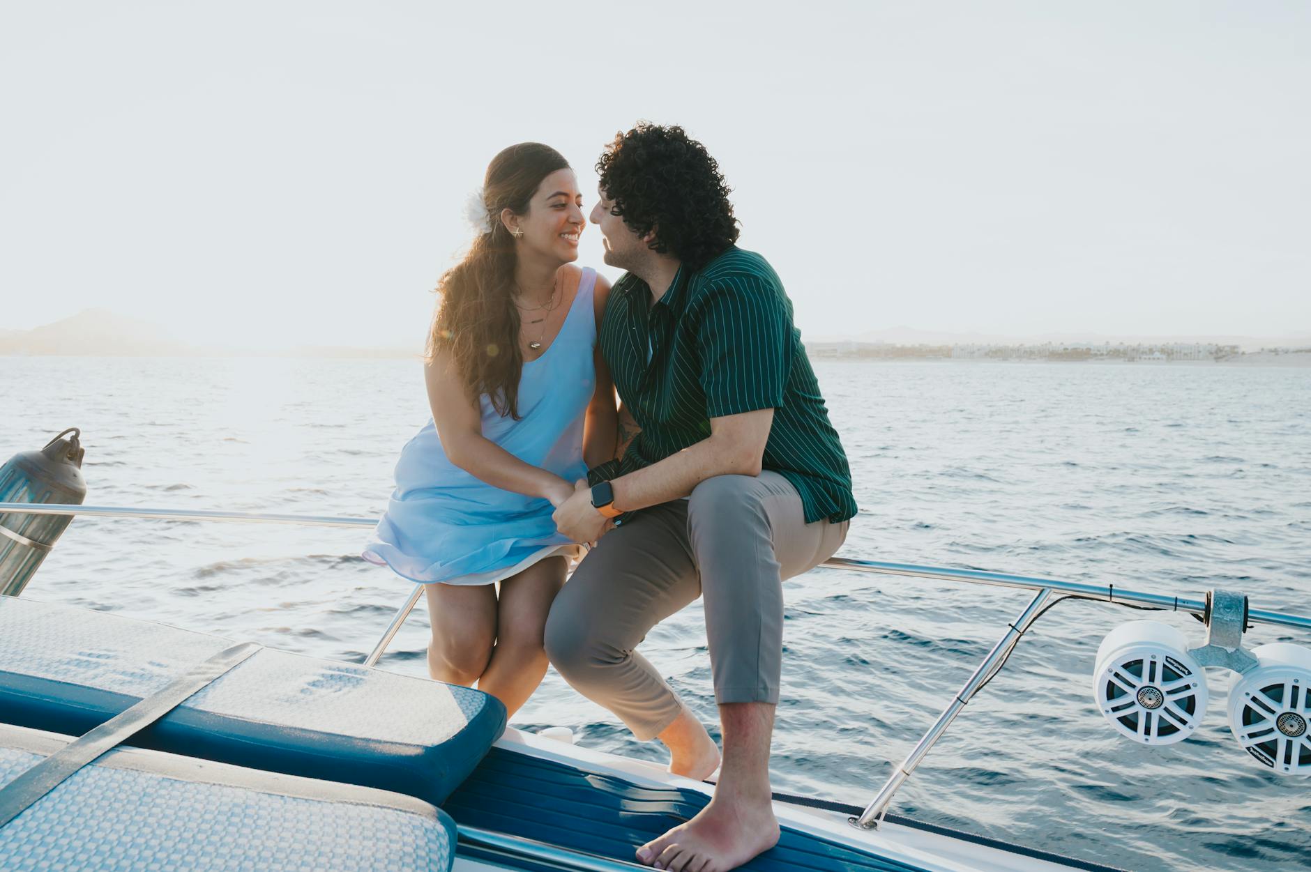 Couple watching the sunset from a boat cruise on the water near Adelaide