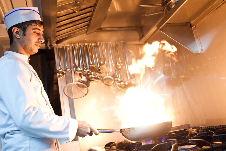 Chef preparing dishes at Adelaide restaurant kitchen