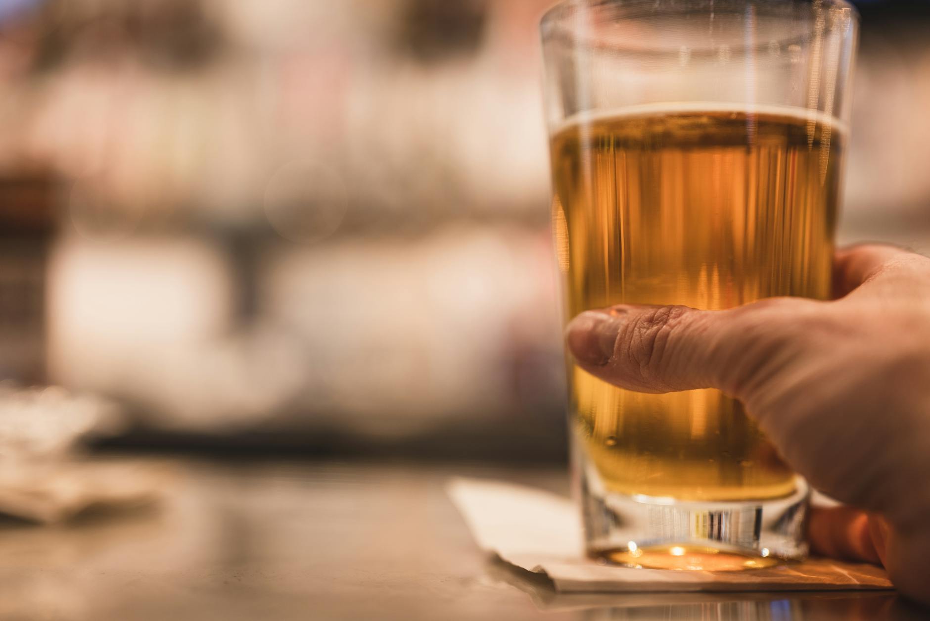 A freshly poured pint of pale ale on an Adelaide pub bar