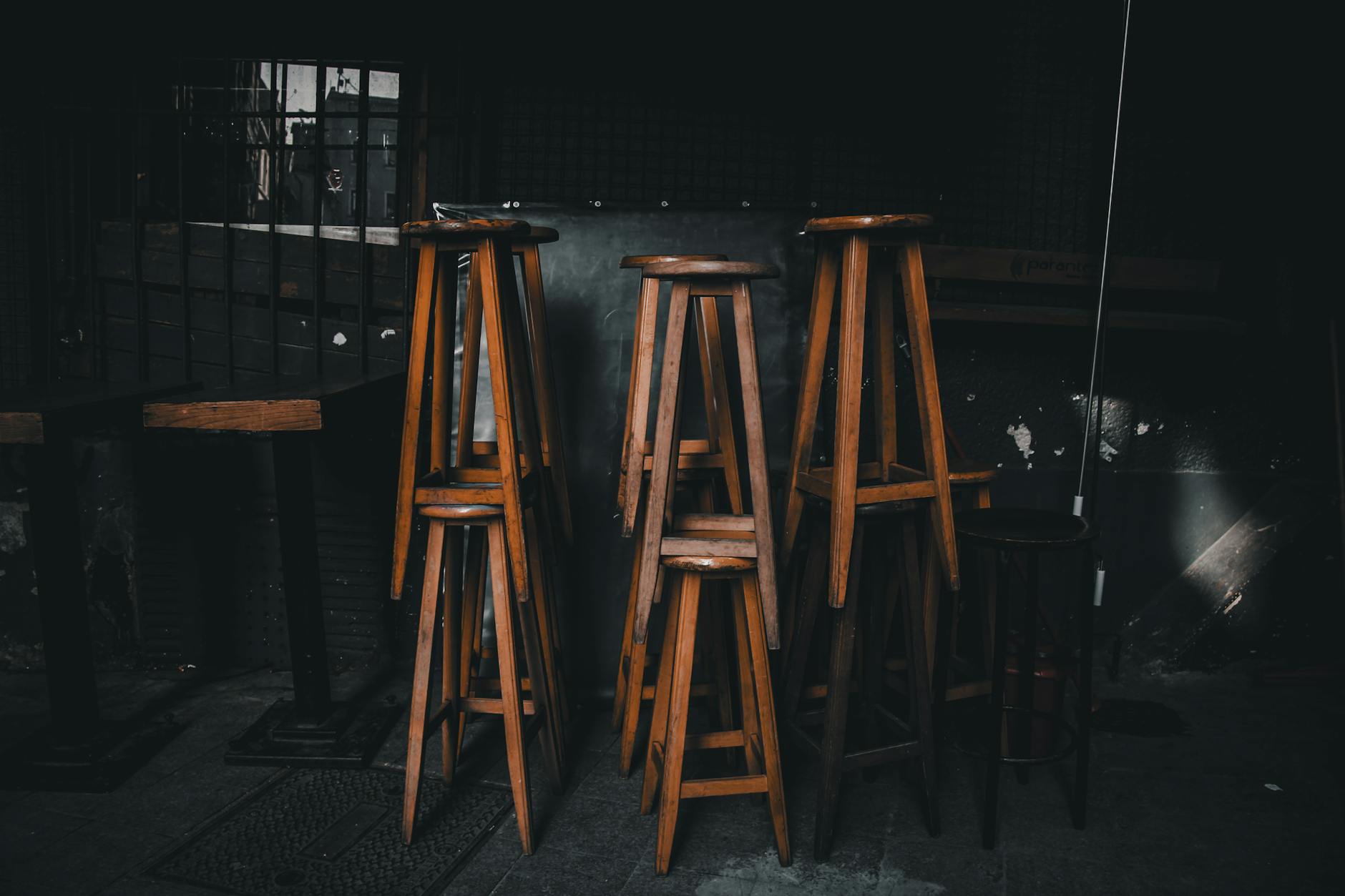 Small bar interior with vintage decor and moody lighting