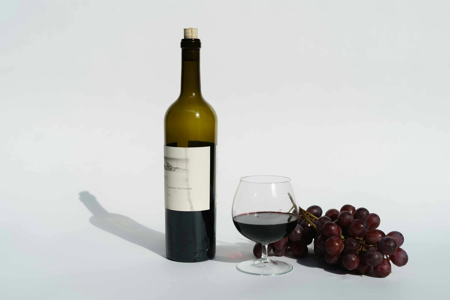 A glass of soft Langhorne Creek Cabernet beside the vines