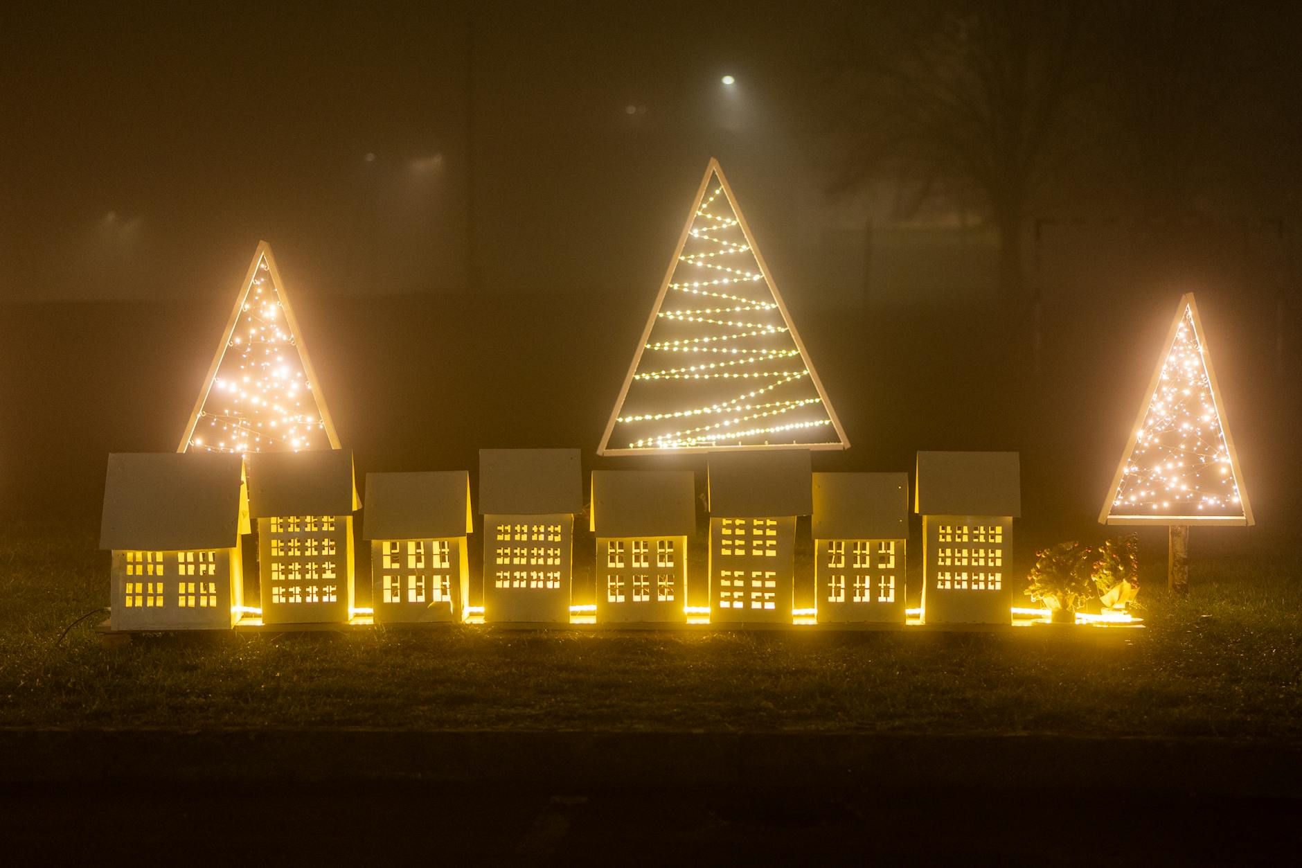 House decorated with elaborate Christmas lights at night in the Adelaide Hills