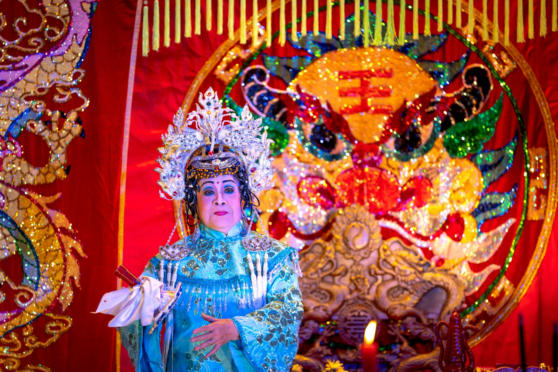 A colourful Asian cultural performance on stage, part of the OzAsia Festival program in Adelaide