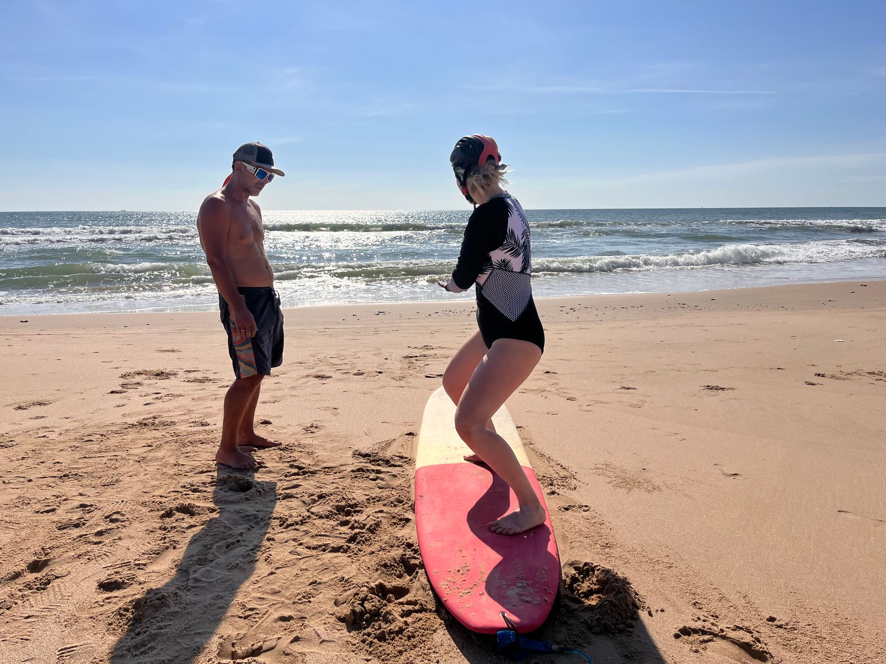 A beginner surf lesson on a beach near Adelaide
