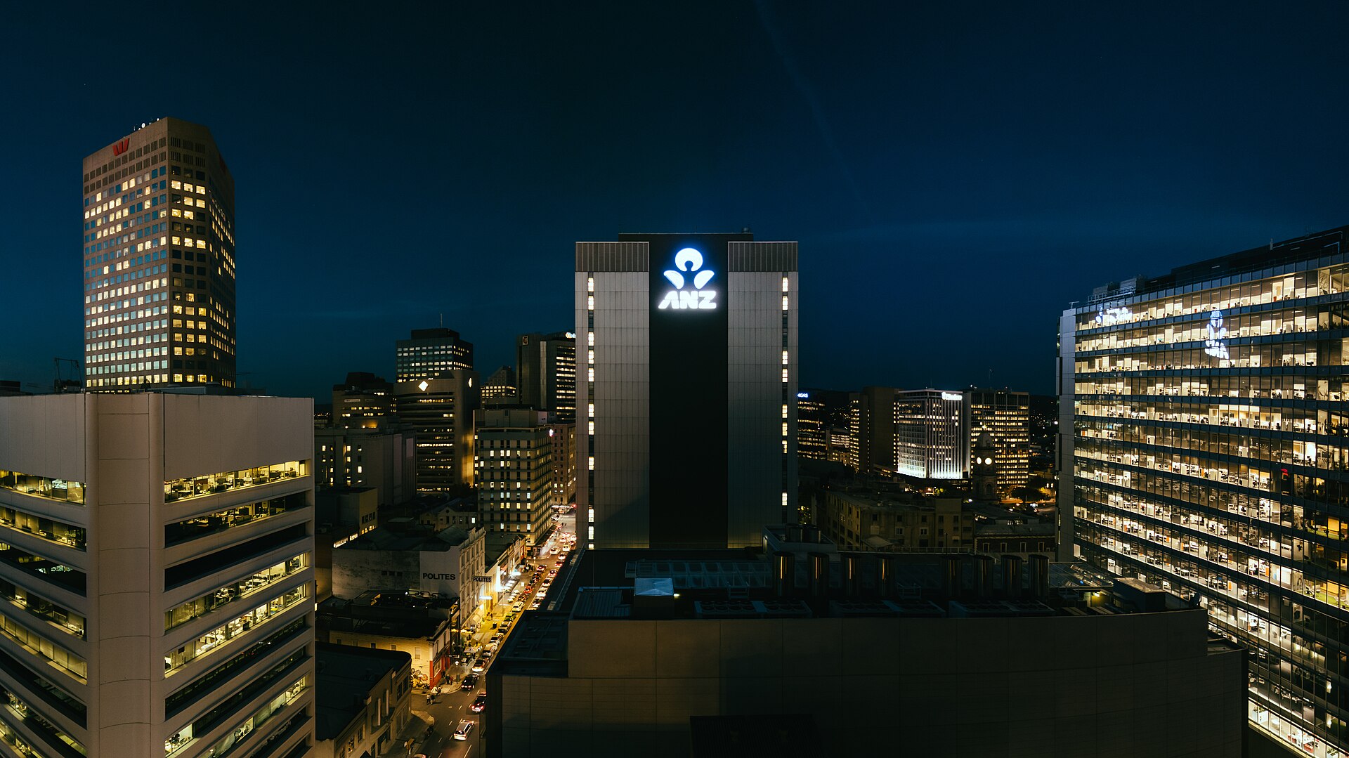 Adelaide's central business district lit up at night with office towers and street lights